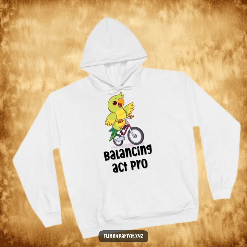 Funny hoodie featuring a parrot determinedly and cheerfully riding a unicycle, offering warmth and encouragement.